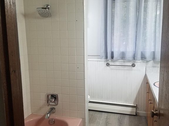 Upstairs bathroom. Double sinks to the right.