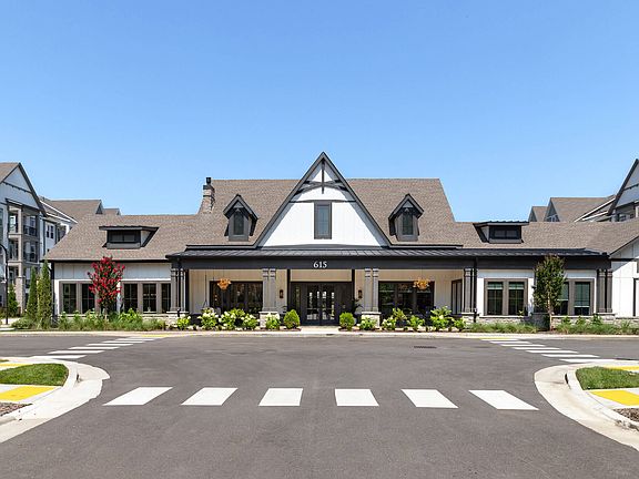 Harpeth Heights Leasing Center with Classic Architecture and Lush Landscaping