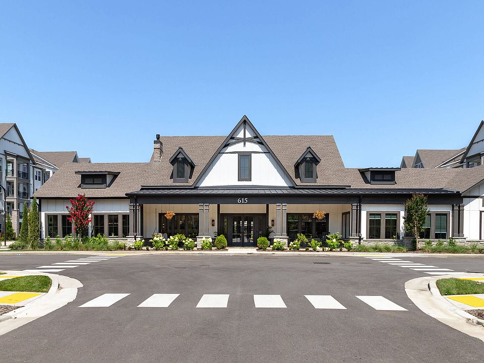Harpeth Heights Leasing Center with Classic Architecture and Lush Landscaping