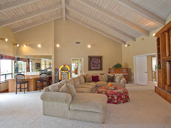 Spacious Family Room with Open Beam Ceiling