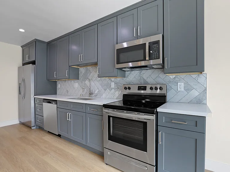 Kitchen Area with Stainless Energy-Efficient Appliances
