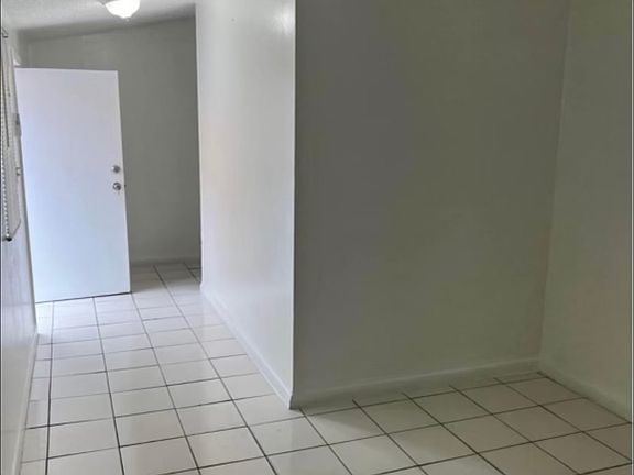 Hallway to bedroom and living room
