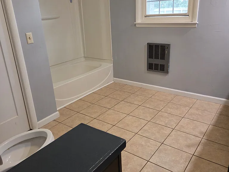 Full bathroom - has 2 closets for storage