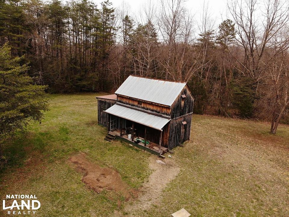 Cabin with electricity, water and septic (Sold AS IS)
