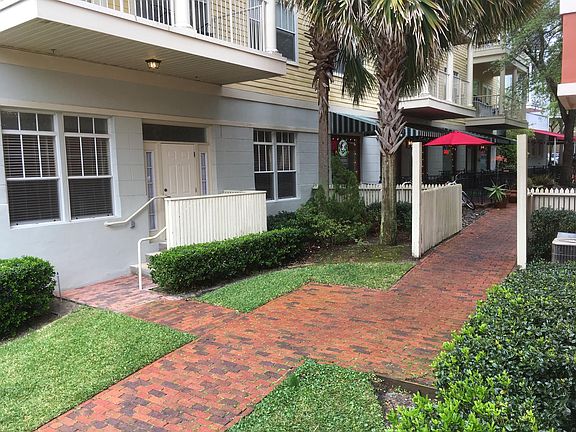 Rear entrance, your parking space is where picture was taken