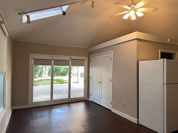 Interior, showing vaulted ceiling, fan and skylight