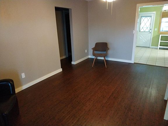 View from front door, looking into living room and kitchen.