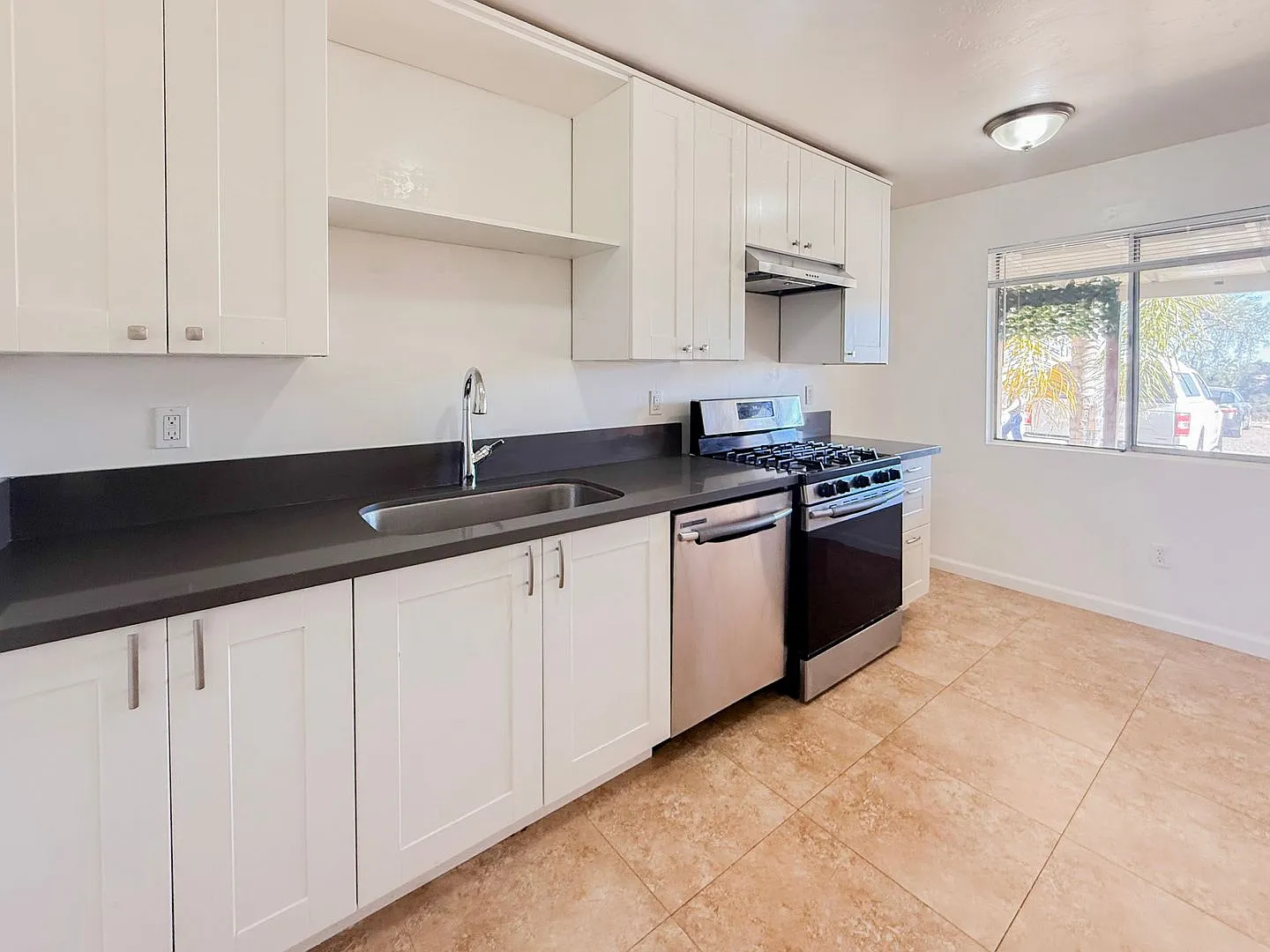 Modern 2BR/1Bth Apartments with Private Patio and Parking — Photo 3