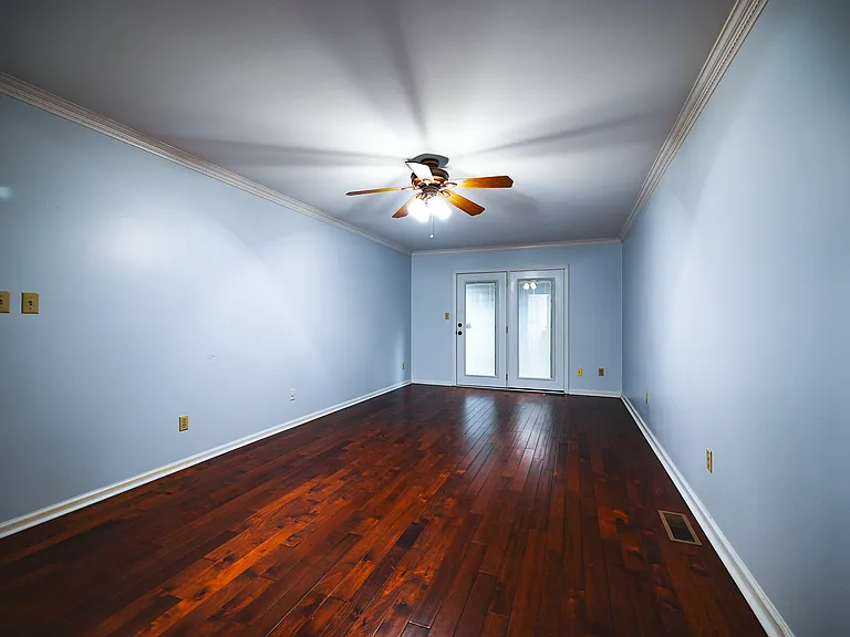 Primary bedroom opens to private deck.