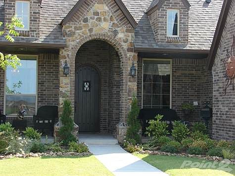 Covered front porch with seating area