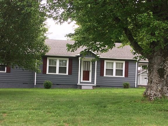 Newest pic of front with burgundy paint and storm door