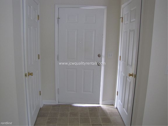 Entry door with two coat closets
