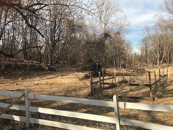 three acres of fenced pasture, garden