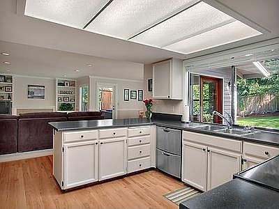 Kitchen Opens up to Family Room and Eating Area