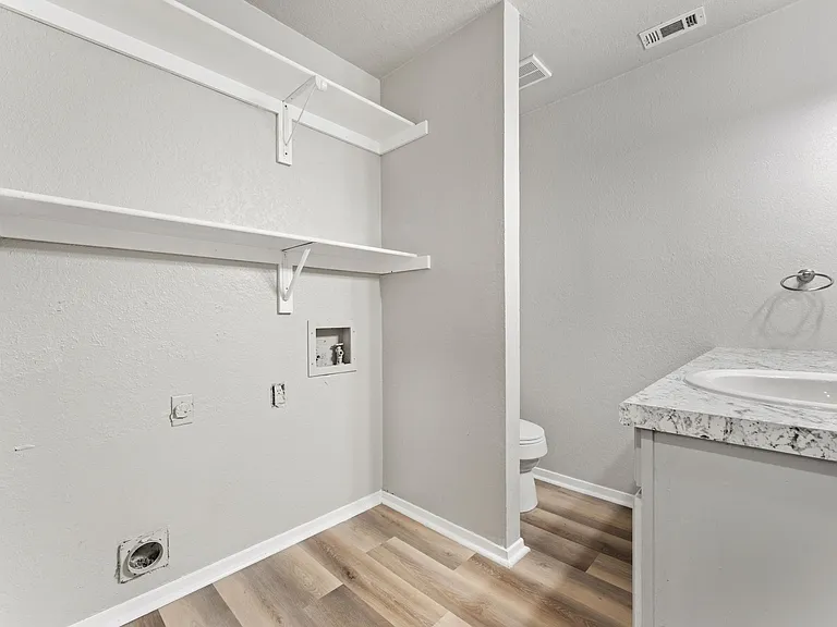 Hall bathroom/washer/dryer hook-up