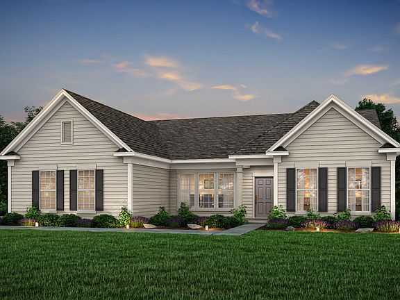 Tangerly Oak Exterior 1 features siding, covered front porch and 2 car side load garage