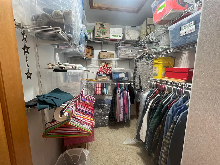 huge walk in closet with lots of storage!