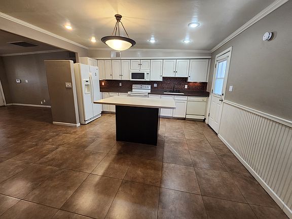 3rd image of 7137 E 32nd Pl