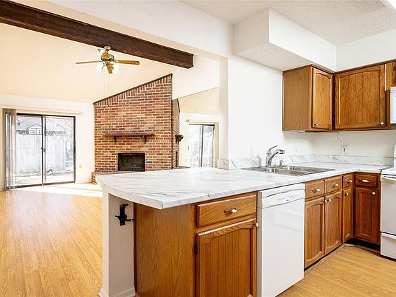 Kitchen opens to living area