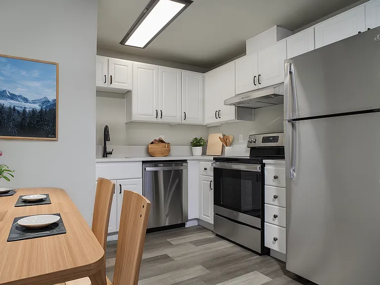 Experience the elegance of this chic modern kitchen, perfect for culinary adventures and cozy dinners. Experience the elegance of this chic modern kitchen, perfect for culinary adventures and cozy dinners.