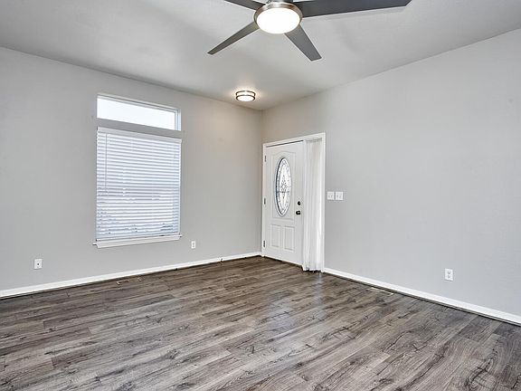View through living room to front door.