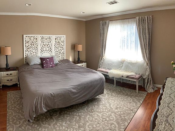 Master bedroom suite easily fits any size bed.