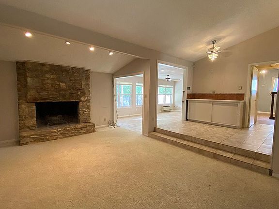 Den, sunroom,kitchen