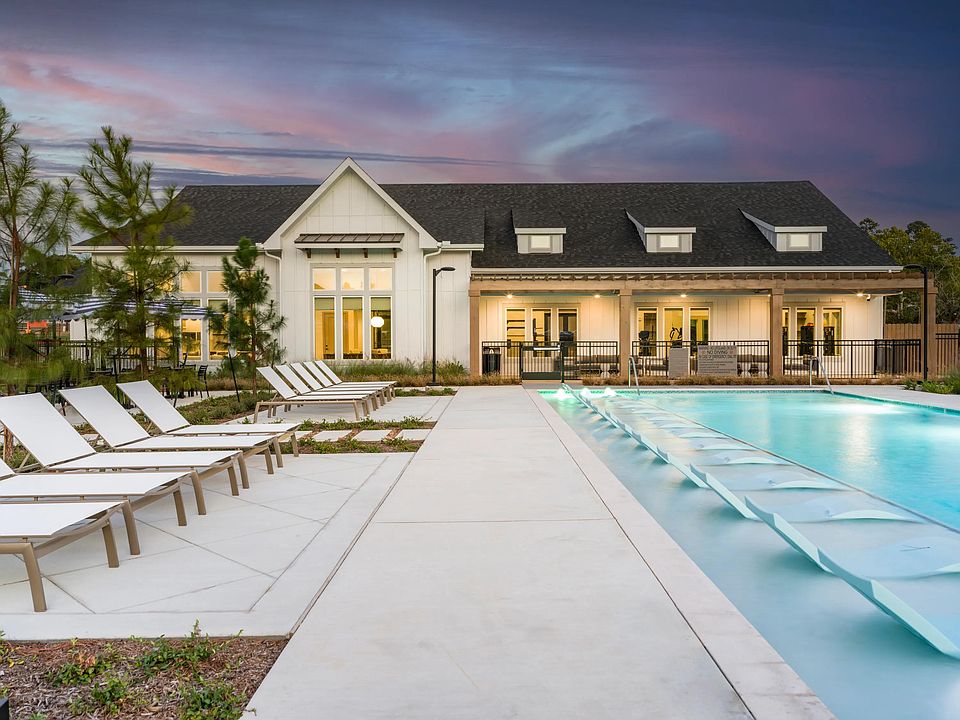 Resort-style pool with spacious sundeck at Beckett West Fork apartment homes in Conroe, TX.