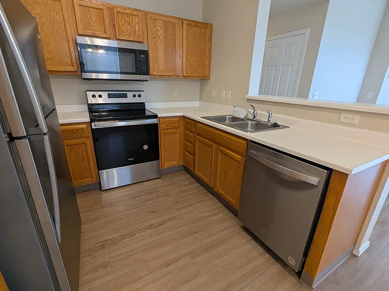 Kitchen features recently updated stainless steel appliances.
