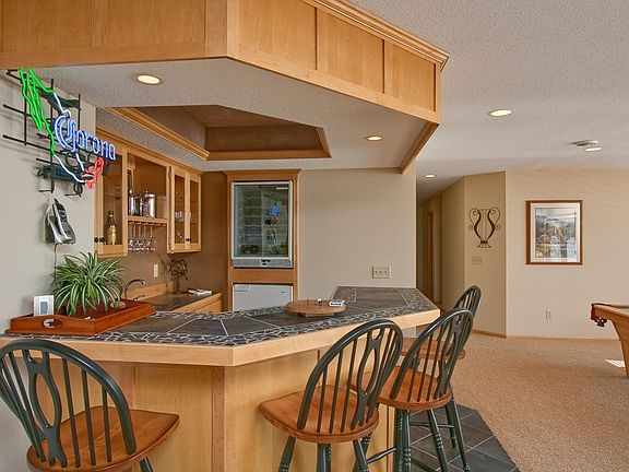 Family Room Features an Awesome Bar...Great For Entertaining