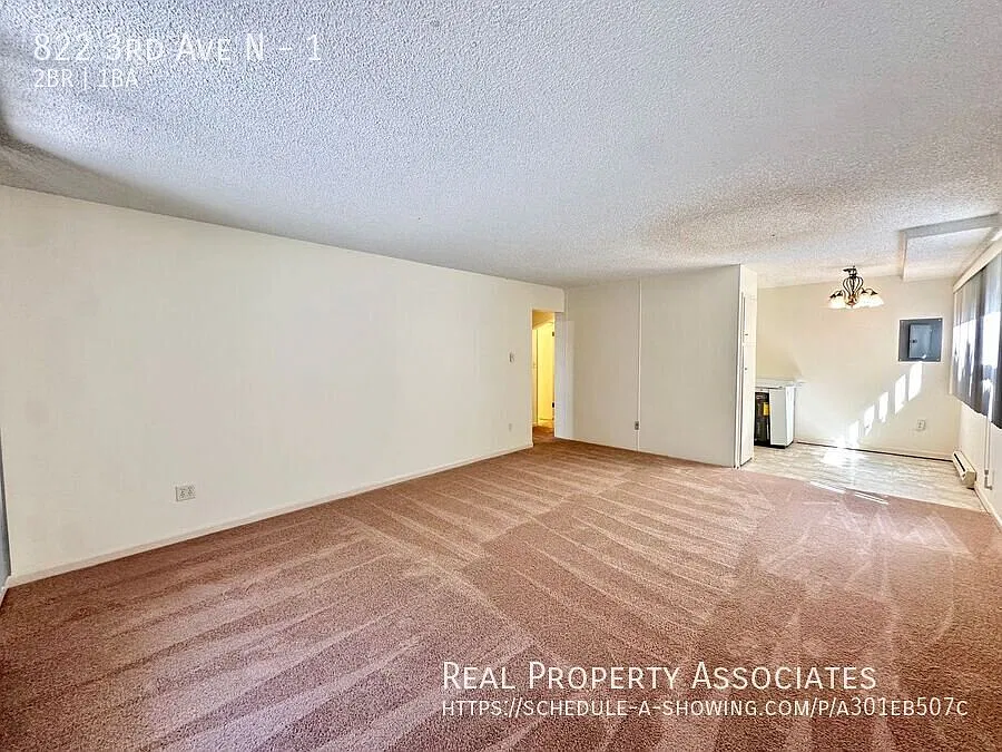 2-Bedroom Corner Unit Available in Queen Anne! **Off-Street Parking Included and Space Needle View — Photo 3