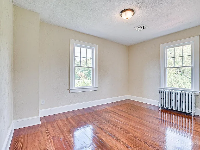 338 Buckelew Ave — Photo 22