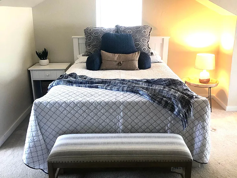 Queen bed with all new linens in a cozy vaulted loft!