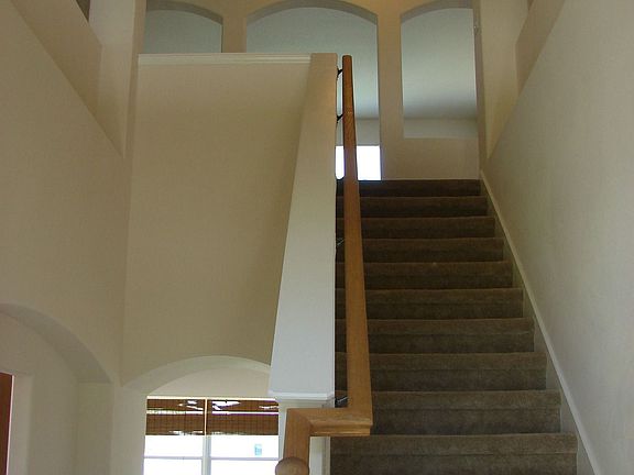 A TRUE "WOW" EFFECT WITH 20 FOOT CEILINGS WHEN ENTERING HOME