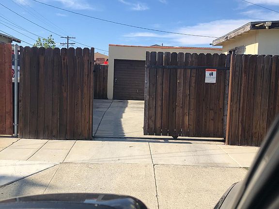 Electric remote controlled entry that opens up to the 2 car garage and backyard where you can enter in the bonus room, Master bedroom and the kitchen
