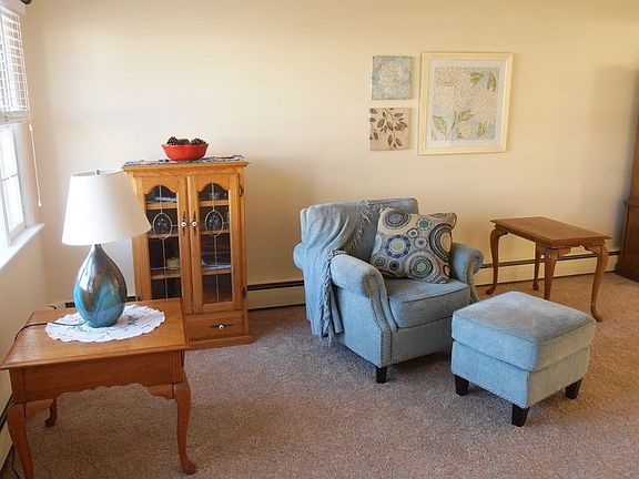 Living Room
						:
						Freshly painted with new wall to wall carpeting