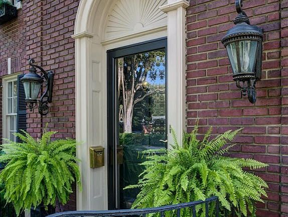 Entryway with bricked walkway