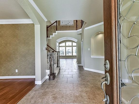 As You Enter the Beautiful Glass Door into the Foyer You See a Grand View of the Arbor in the Back Yard. The Dining Room is on the Left & the Study is on the Right.