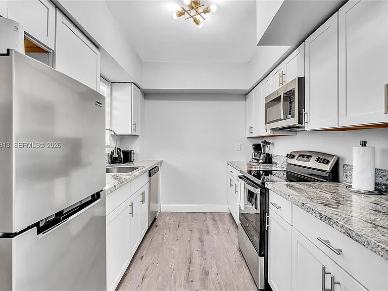 10002 E Bay Harbor Dr #6 — Photo 14