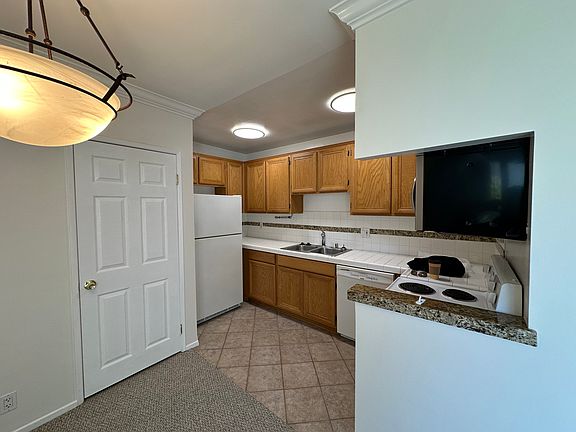 Kitchen includes fridge