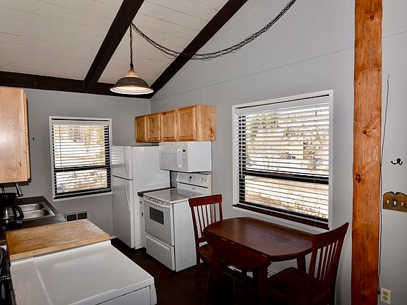 Facing the kitchen from the hallway and bedroom