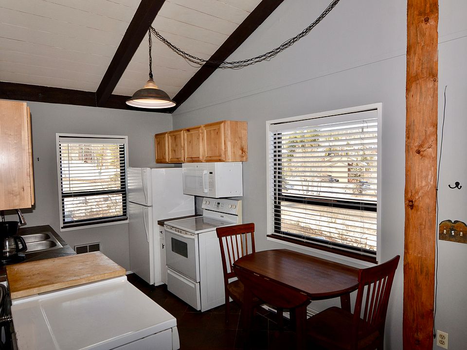 Facing the kitchen from the hallway and bedroom