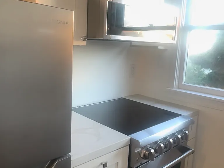 New fridge/micro/cabinets/full size stove 1 year old.