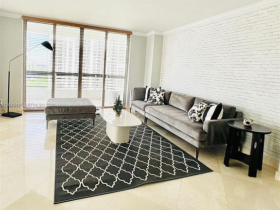5th image of 3600 Mystic Pointe Dr APT 1401