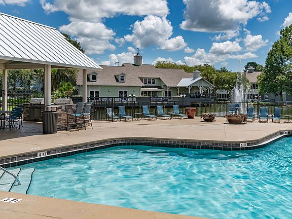Community pool with covered lounge