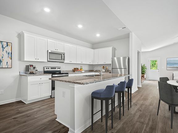 Enjoy a full suite of appliances by Whirlpool in this move-in ready home