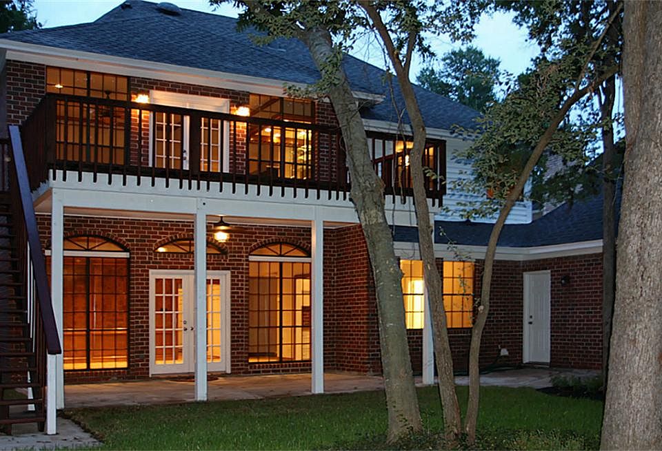 An Evening View of the Back of the Home Showing the Warmth, Comfort & Beauty This Classic Home Has to Offer.