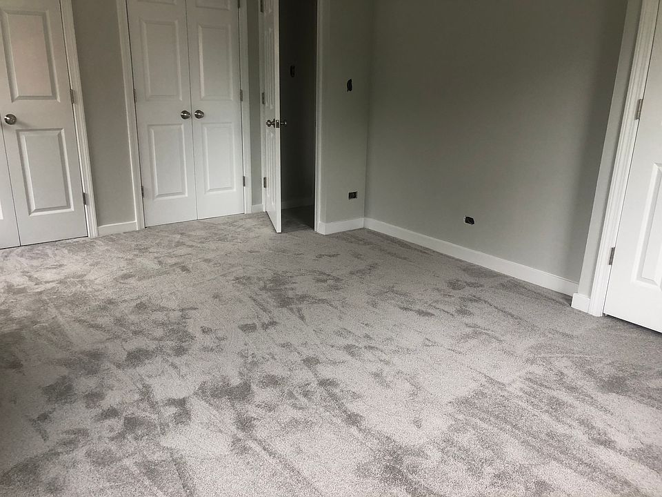 FRESLY PAINTED MASTER BEDROOM WITH 2 CUSTOM CLOSETS AND NEW CARPET