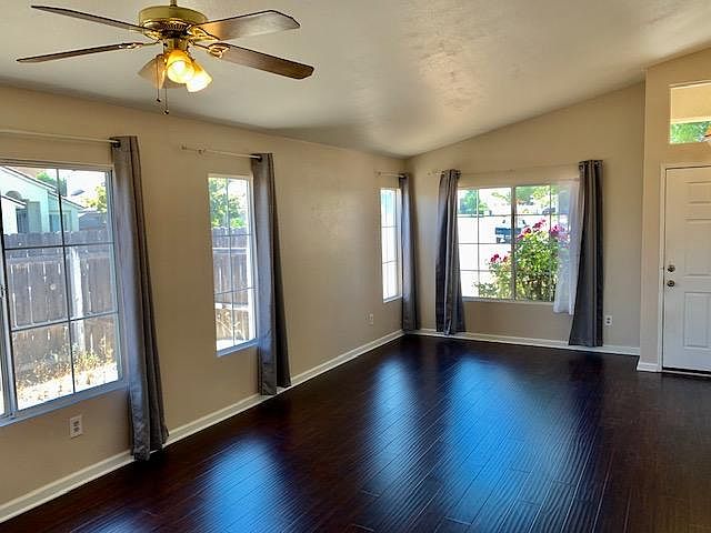 Enter home into formal living room and dining room.