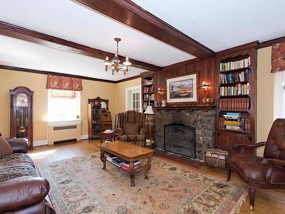 Living room with wood bur